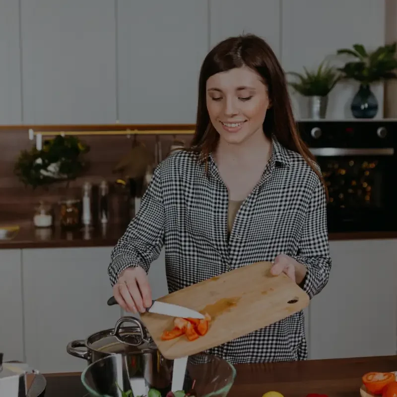 Home chef preparing packaged meals for a homemade food business
